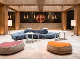 米特区查理检查哨NH精选酒店